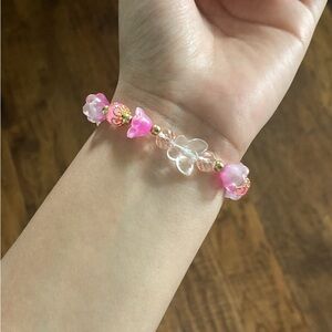 pink and gold butterfly bracelet